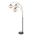 Lampadaire en métal noir à trois arcs abat-jours ajourés bois clair