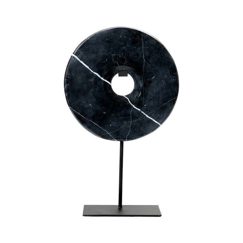 Disque décoratif en marbre noir sur socle métallique