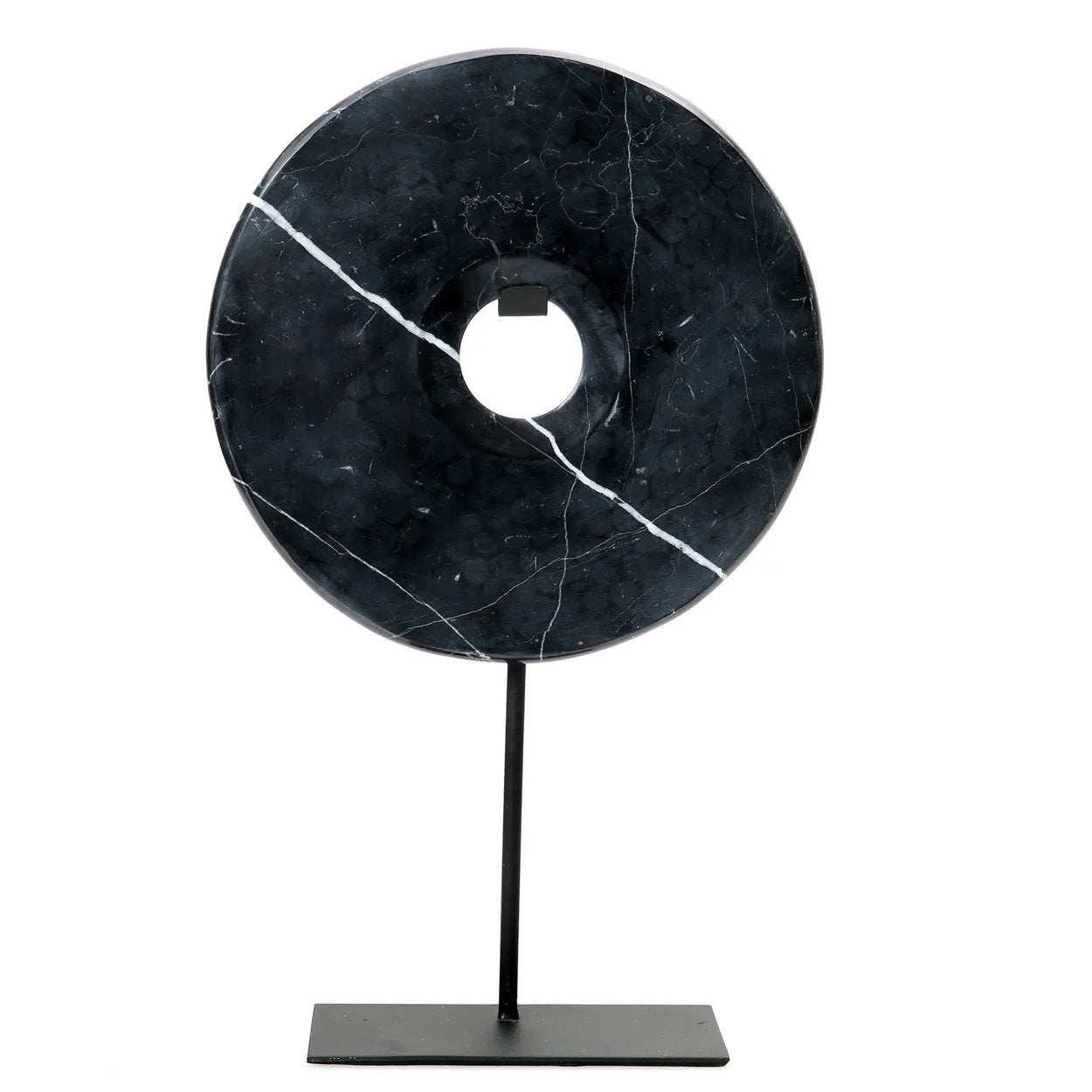 Disque décoratif en marbre noir sur socle métallique