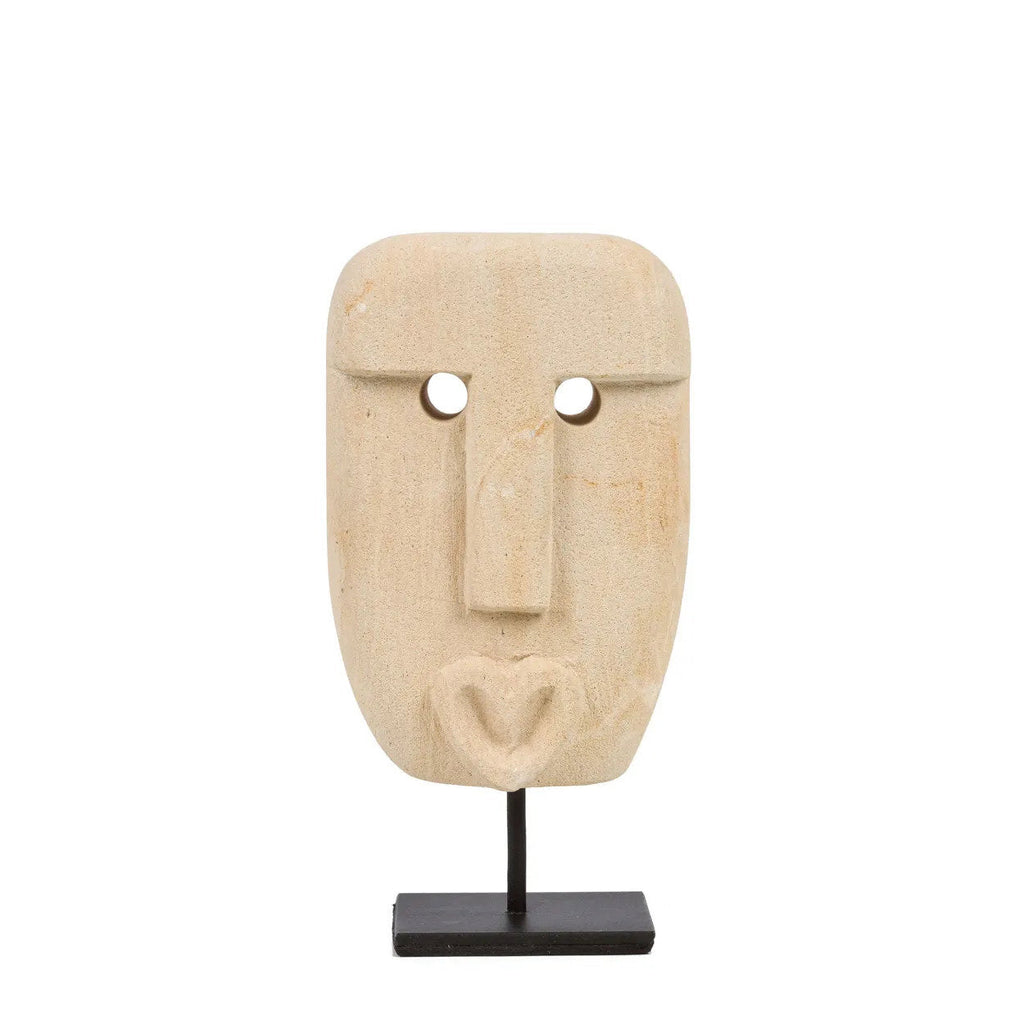 Statue décorative visage stylisé en grès beige sur socle