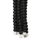 Pompon mural en perles de bois noires suspendu par cordon naturel