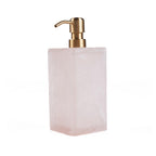 Distributeur de savon en résine marbrée rose et blanche avec pompe dorée