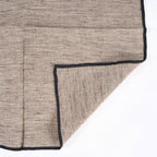 Serviette en lin naturel rayée bordure noire