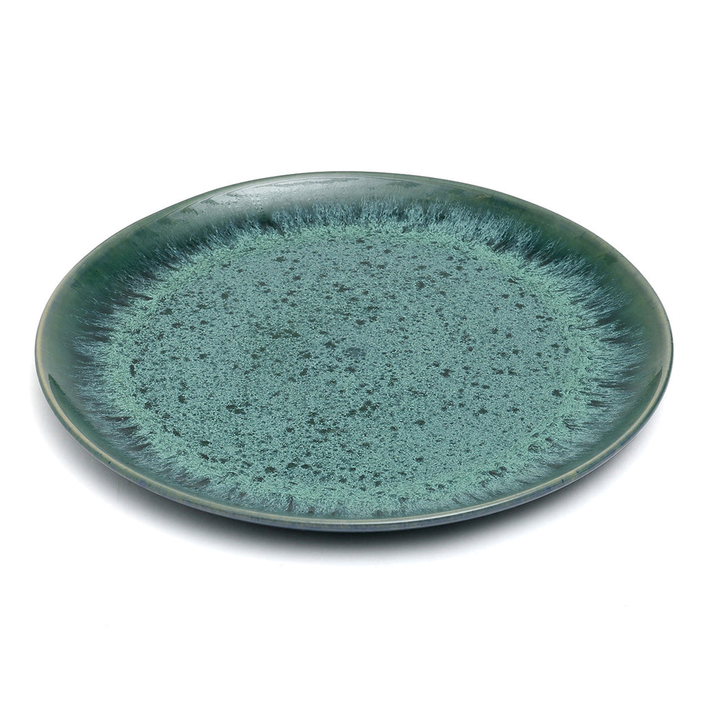 Assiette plate en grès émaillé vert aqua moucheté effet halo