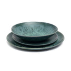 Assiette plate en grès émaillé vert aqua moucheté effet halo