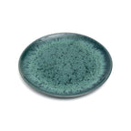 Assiette en grès émaillé vert teal effet moucheté halo radial