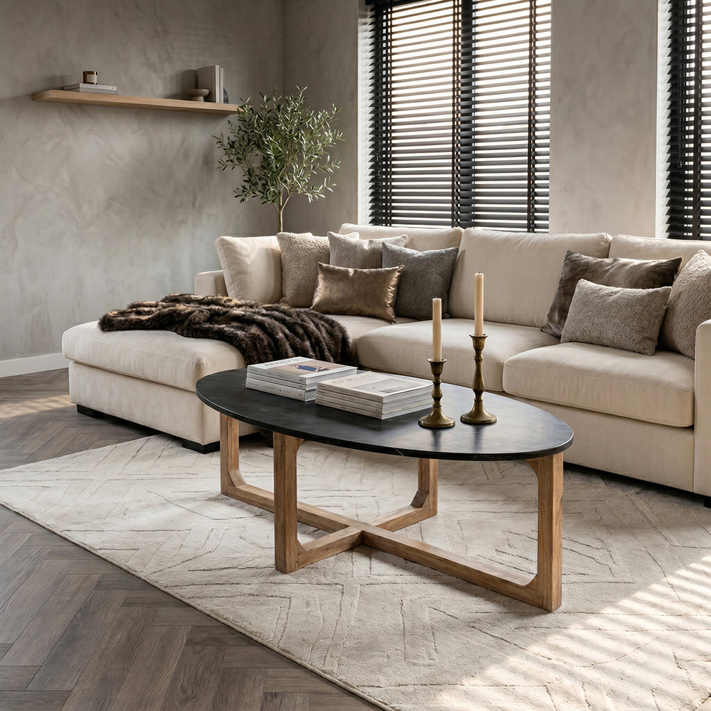 Table basse ovale en marbre noir et bois clair croisé – 120x60 cm