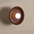 Vue latérale de l'applique murale ronde en bois