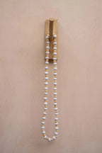 Chaîne murale en perles dorées avec accents de perles, Collier décoratif en perles bois et blanc cassé