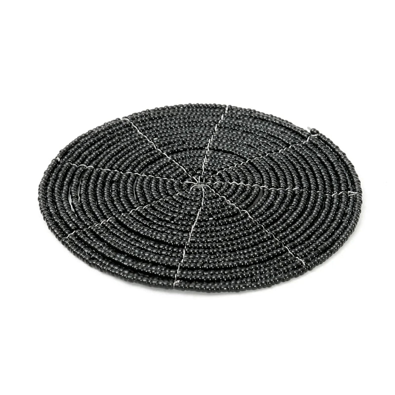 Dessous de verre rond en perles noires motif spirale