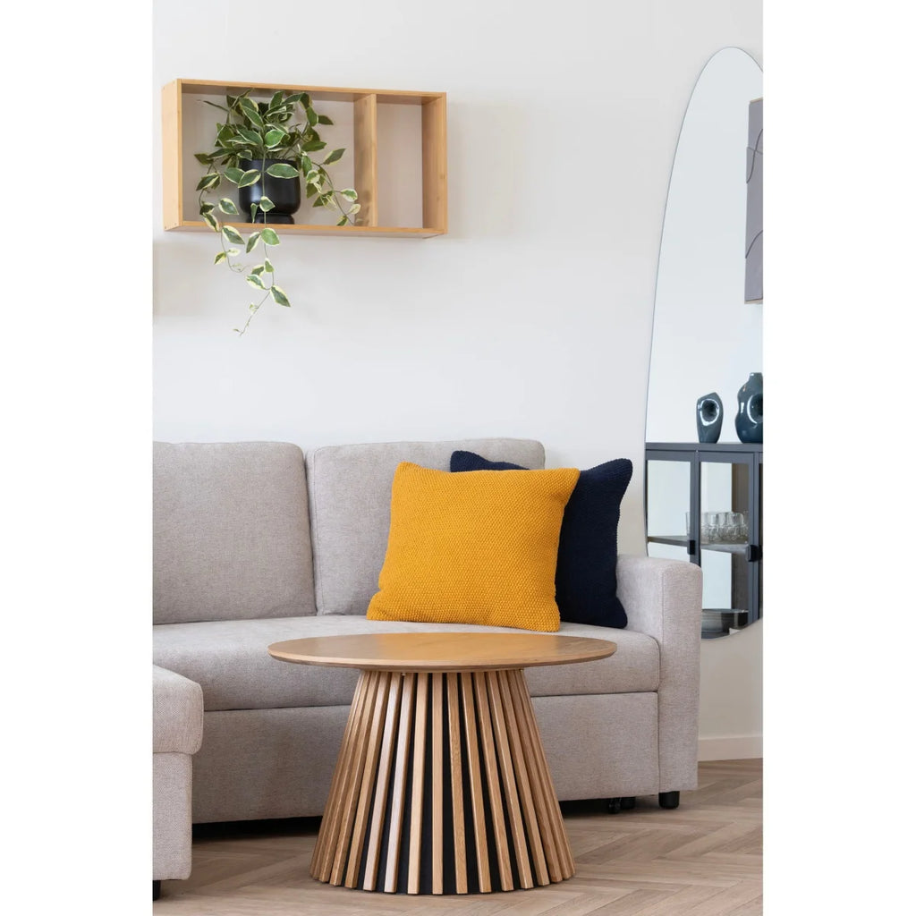Table basse en bois clair avec base rayonnante cannelée