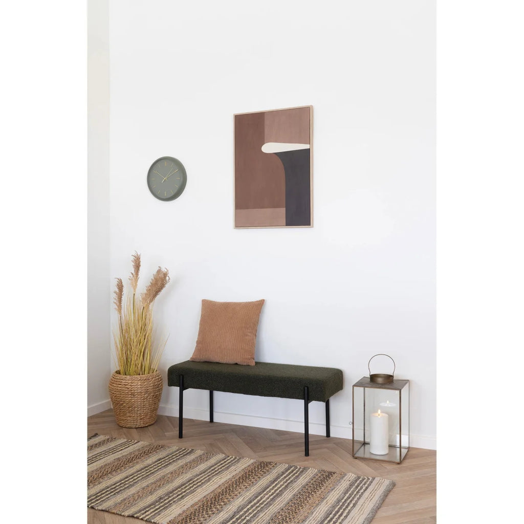Banc en velours vert foncé avec coussin beige et pieds en métal noir