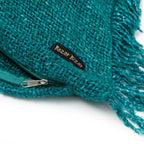Coussin rectangulaire en coton texturé aqua avec franges et fermeture éclair