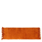 Housse de coussin velours rouille orange à glands 35x100 cm