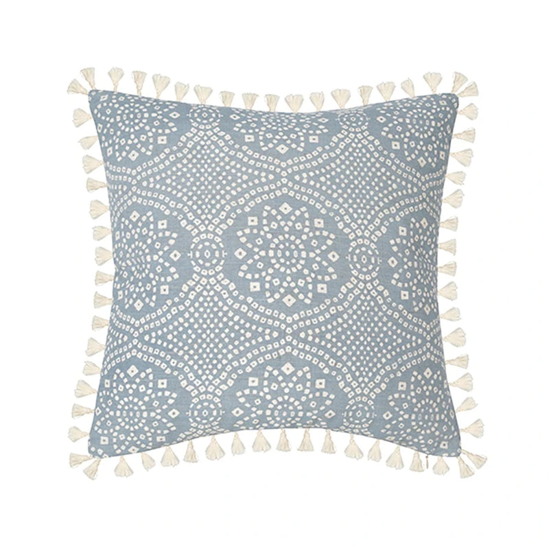 Housse de coussin bleu géométrique