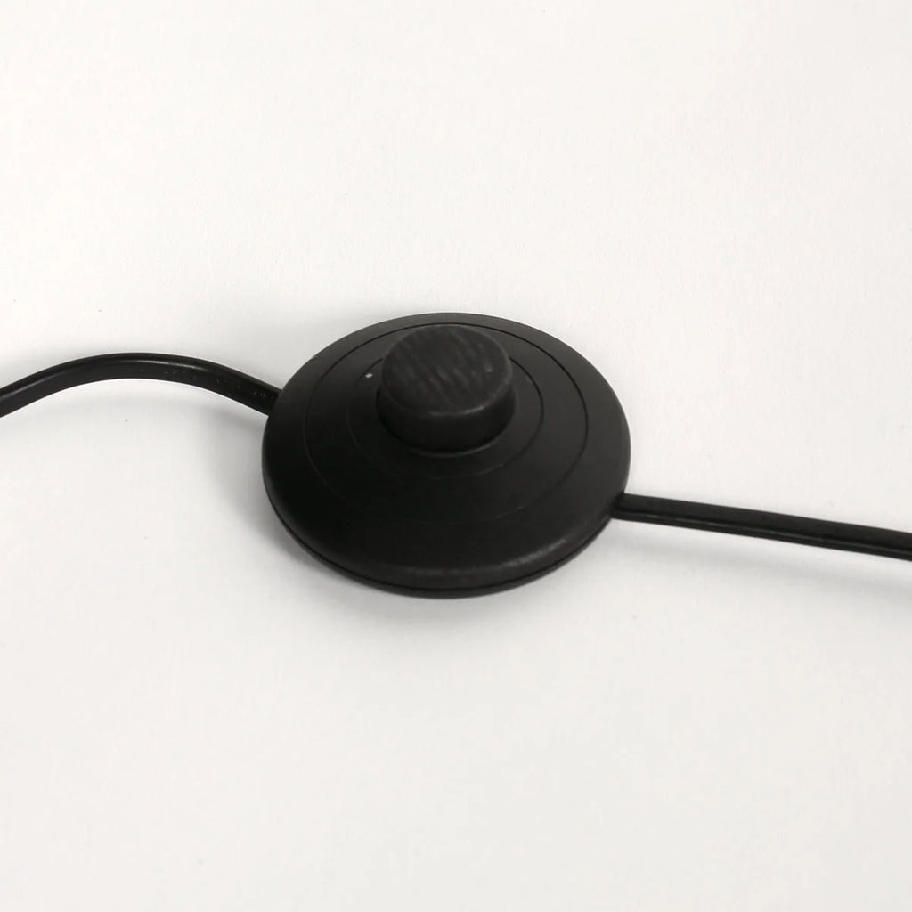 Interrupteur circulaire noir de lampe avec molette centrale et deux cordons