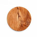 Planche à découper ronde en racine de teck avec grain visible, finition bois naturel