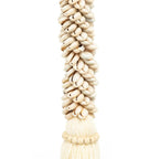 Collier à pompons en coton et coquillages cauris naturels