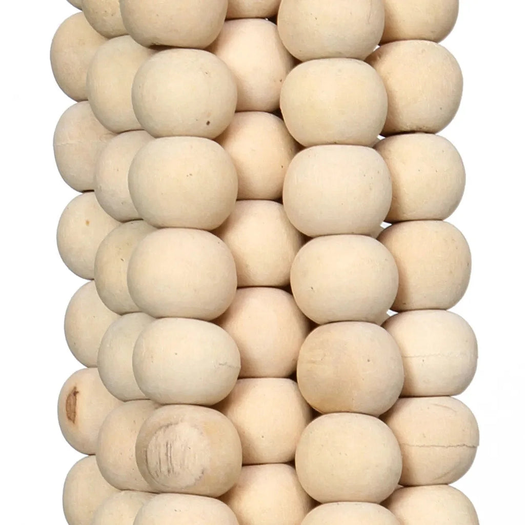 Pompon suspendu en perles de bois naturel fait main avec une pile de perles sphériques claires
