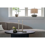 Porte-bougie en céramique beige rond ø13 cm avec deux bougies allumées