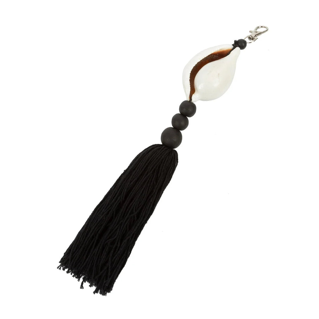 Porte-clés coquillage cauri noir et blanc avec pompon en coton
