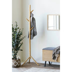 Porte-manteau sur pied en bambou clair forme arbre H163 cm avec veste grise