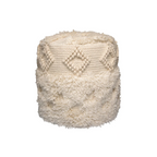 Pouf rond écru en laine et coton avec texture à motifs diamant et franges shaggy