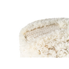 Tapis shag blanc roulé pour décoration intérieure dans le produit Pouf rond en laine écrue et khaki