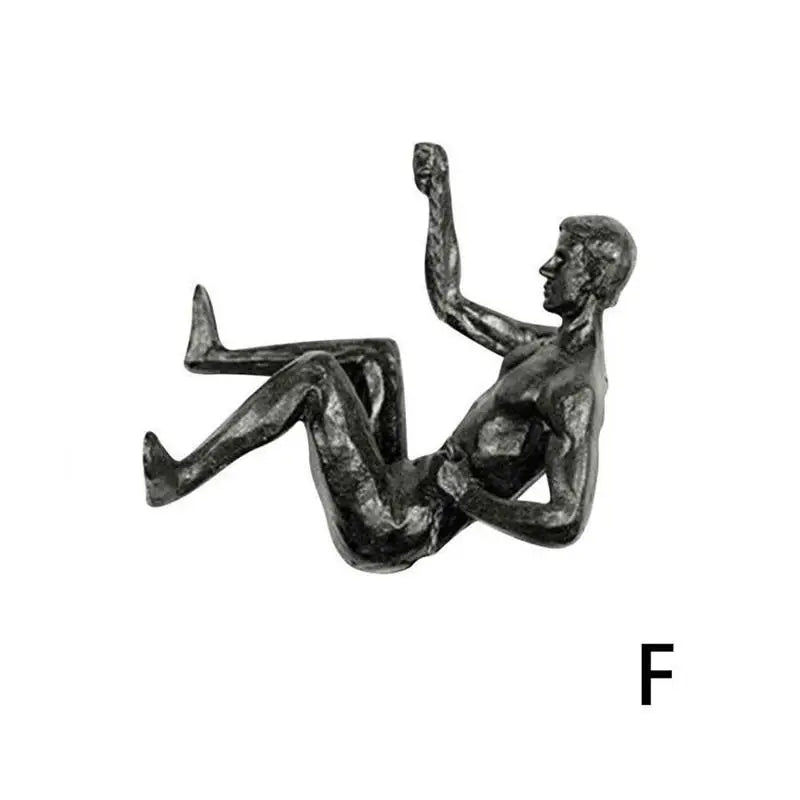 Sculpture murale grimpeur en résine F