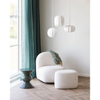 Fauteuil crème texturé peluche avec pouf assorti Ø28 cm