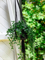 Plante artificielle suspendue avec feuilles vertes en macramé noir cylindrique H100 cm