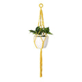 Suspension plante en macramé jaune avec pot de plantes moderne et tressée