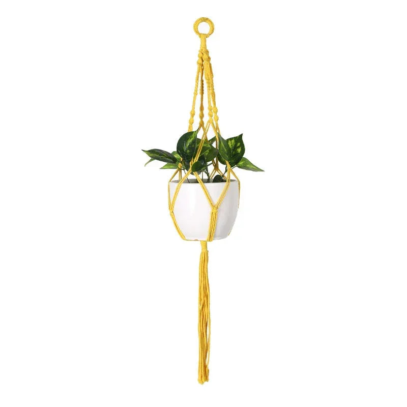 Suspension plante en macramé jaune design tressé moderne