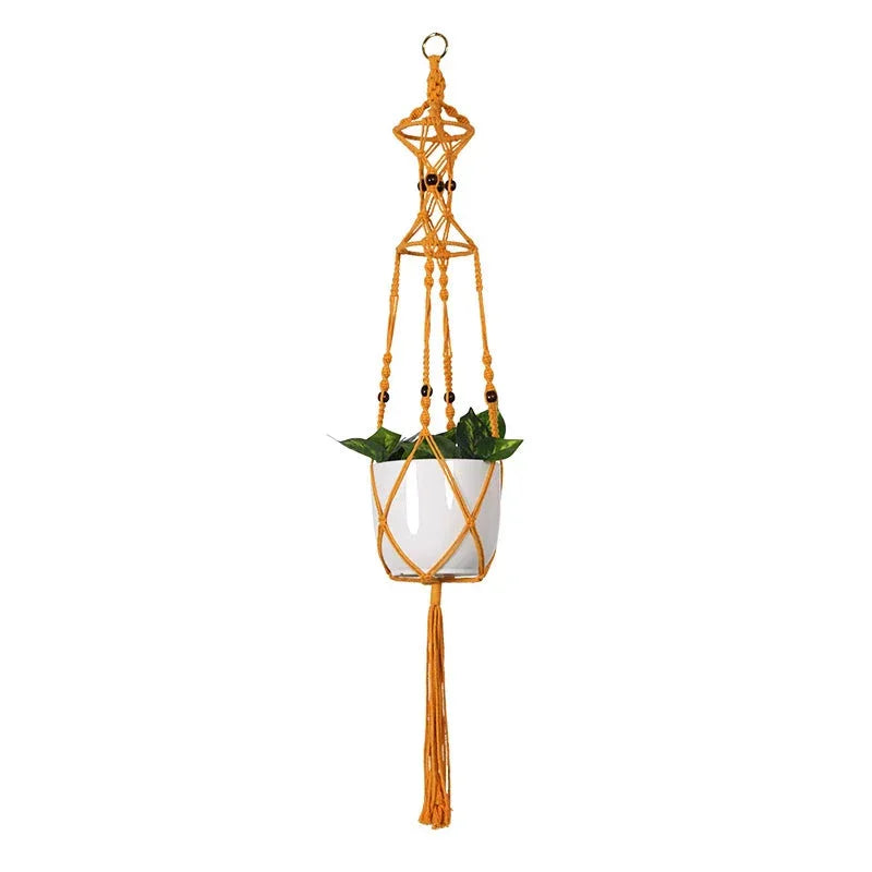 Suspension plante macramé orange en corde tressée à franges