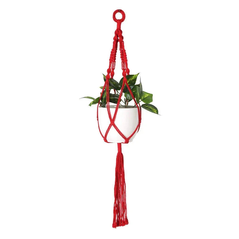 Suspension plante en macramé rouge à franges longues forme cylindrique