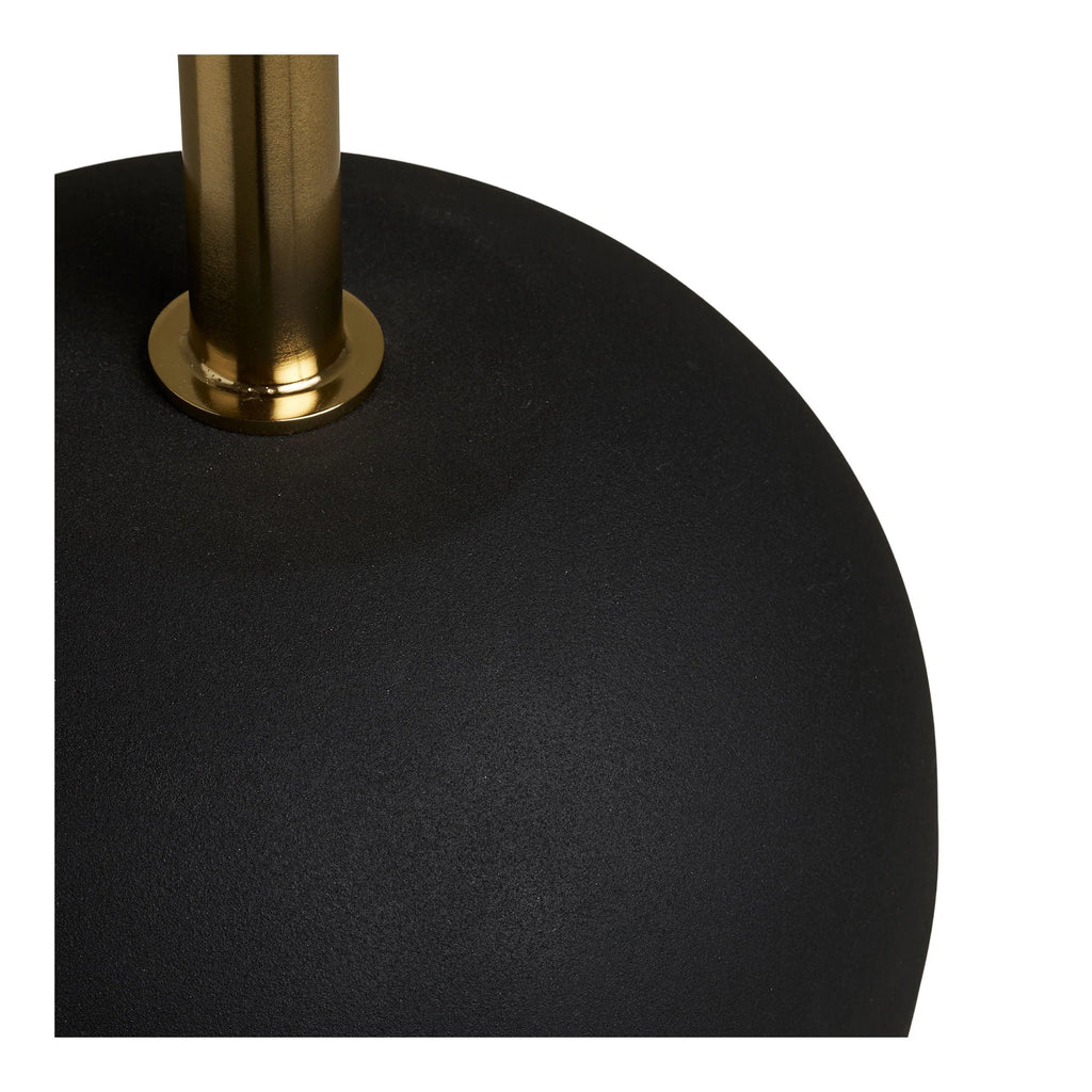 Base de lampe noire mate avec tige laiton poli sur table ronde bois et métal Ø30xH56 cm