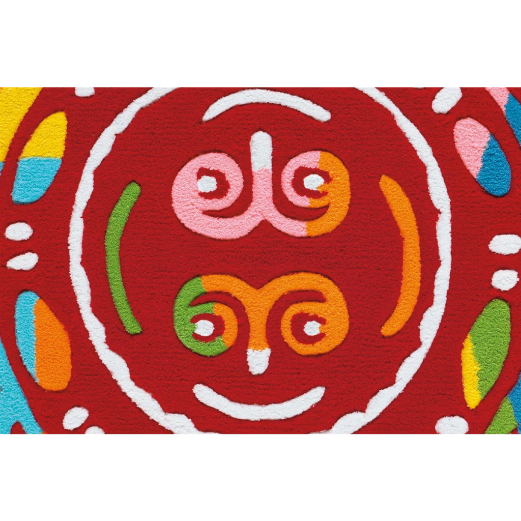 Visage abstrait coloré sur tapis rouge texturé pour le produit Spirit Glowy AE 3145 Rot Mandala