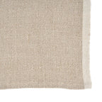 Torchon en lin naturel beige plié motif poisson blanc écru