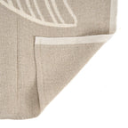 Tapis en lin naturel beige avec motif feuille blanc subtil