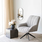 Fauteuil en tissu gris texturé avec base étoilée noire